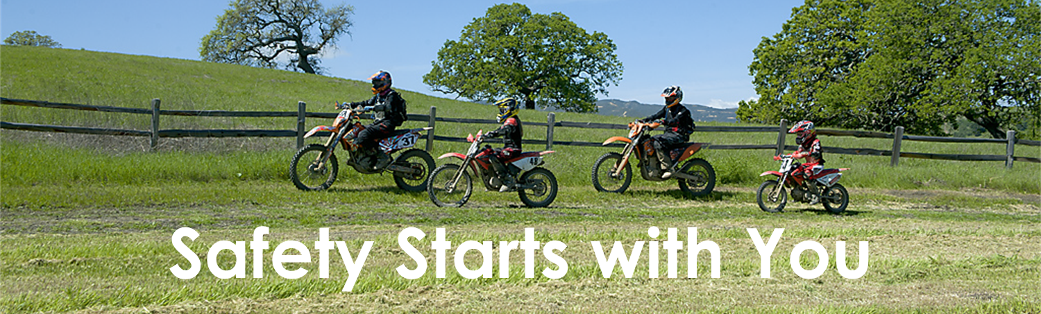 family on dirt bikes